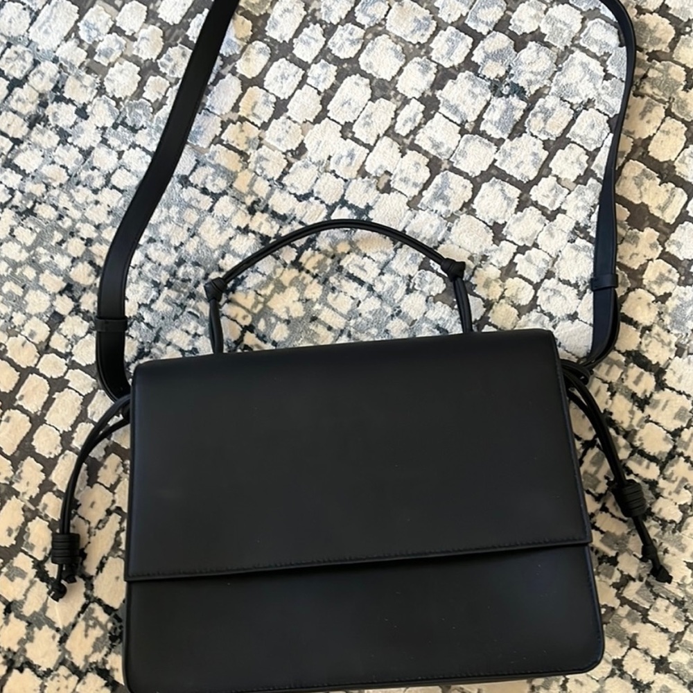 VON HOLZHAUSEN The Handheld includes tag and dust bag